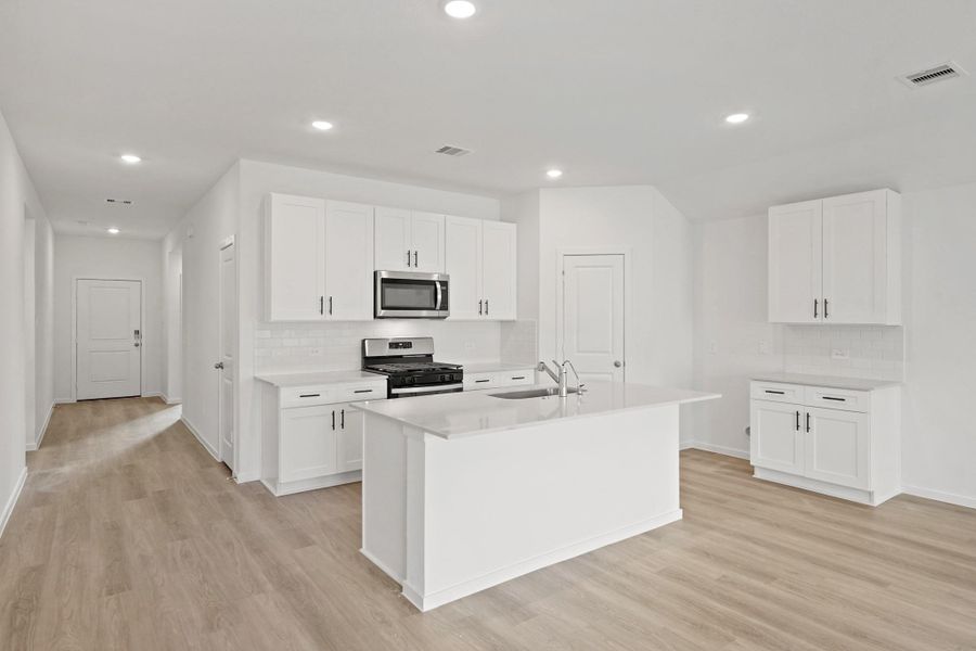 Furnished interior view inside a new home in Grand Pines, Magnolia (Image 4).