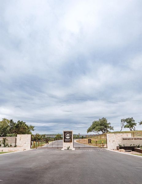 Front exterior of a new home in , Dripping Springs, TX, highlighting curb appeal (Image 8). Front exterior of a new home in , Dripping Springs, TX, highlighting curb appeal (Image 8).