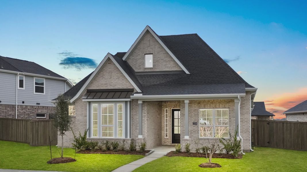 Representative exterior photo of a completed home built from the Palmer by Chesmar Homes in Riceland Alley Loads, Mont Belvieu, TX (Image 23).