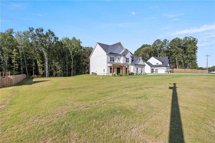 Front exterior of a new home in , Winder, GA, highlighting curb appeal (Image 2).