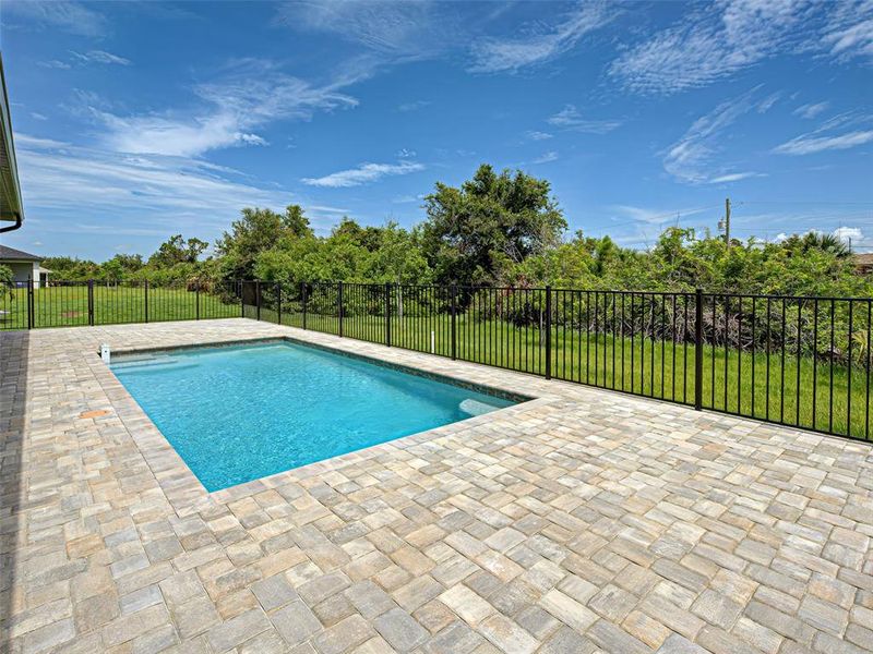 Exterior details and patio area of a home in , Port Charlotte (Image 29).