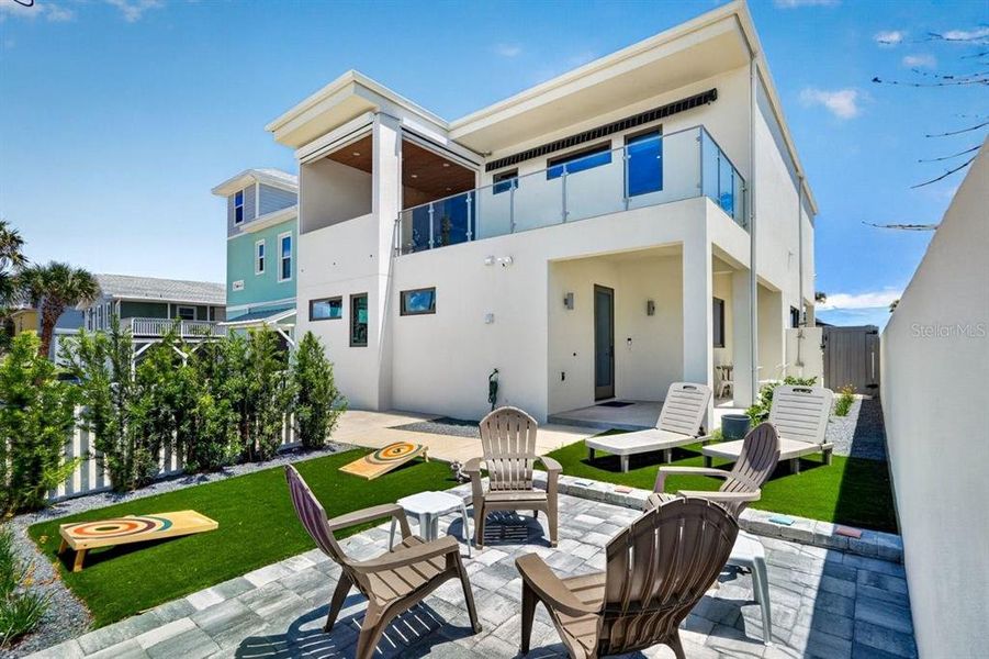 Exterior details and patio area of a home in , New Smyrna Beach (Image 40).