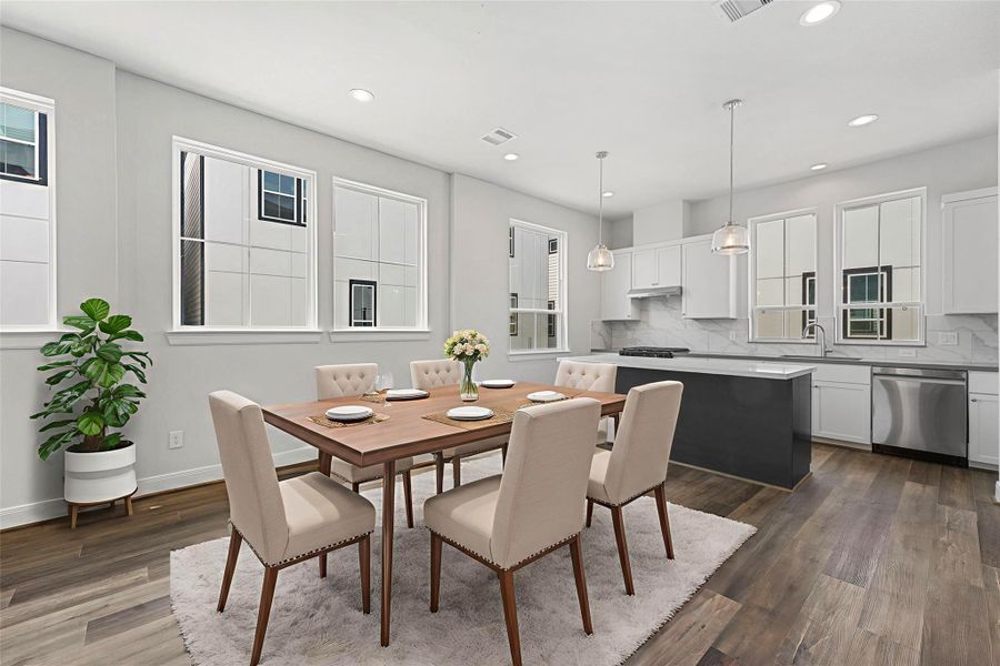 Furnished interior view inside a new home in The Corner At Buffalo Pointe, Houston (Image 11).