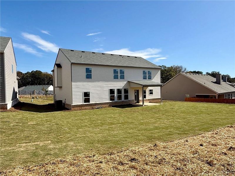 Exterior details and patio area of a home in , Buford (Image 3). Exterior details and patio area of a home in , Buford (Image 3).