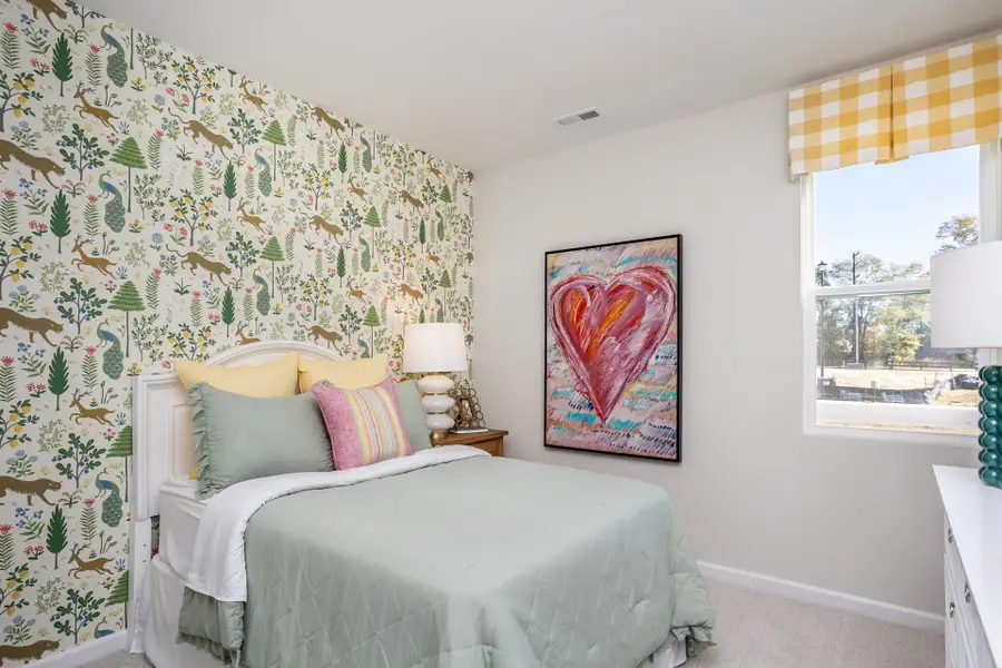 Representative furnished interior of a home built from the Mallard by McKee Homes in Coventry Woods, Fayetteville (Image 8).