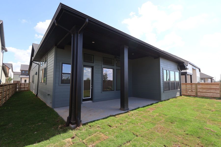 Exterior details and patio area of a home in Bridgeland Central: Emerald Heights - Enclave Collection, Cypress (Image 3).