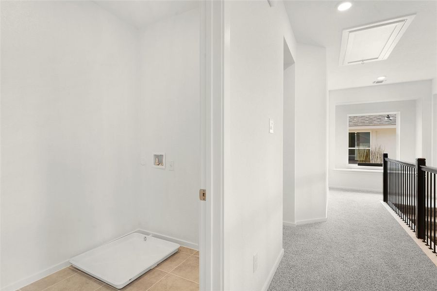 Corridor featuring attic access, an upstairs landing, and recessed lighting Corridor featuring attic access, an upstairs landing, and recessed lighting