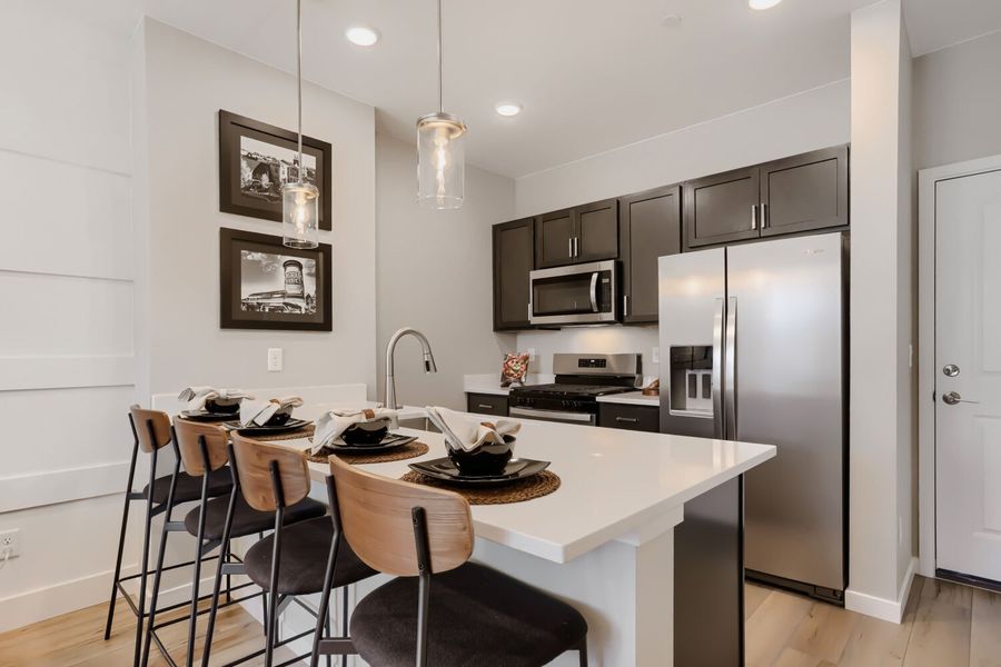 Representative furnished interior of a home built from the Novella One by Brookfield Residential in Barefoot, Firestone (Image 8).
