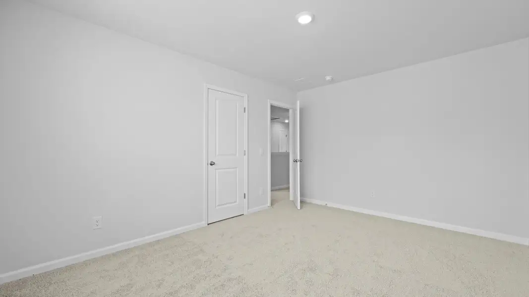 Spacious, unfurnished interior of a new home in Pine Hills Townhomes at Cane Bay, Summerville (Image 24). Spacious, unfurnished interior of a new home in Pine Hills Townhomes at Cane Bay, Summerville (Image 24).