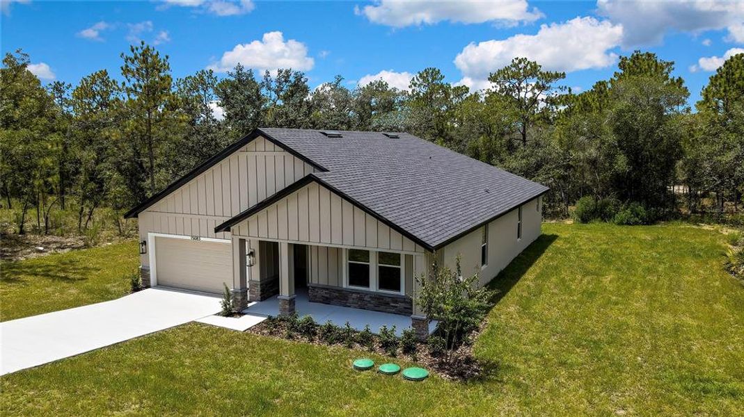 Front exterior of a new home in , Brooksville, FL, highlighting curb appeal (Image 24).