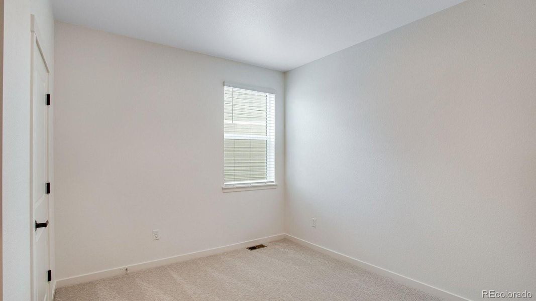 Spacious, unfurnished interior of a new home in Hansen Farm, Fort Collins (Image 26).