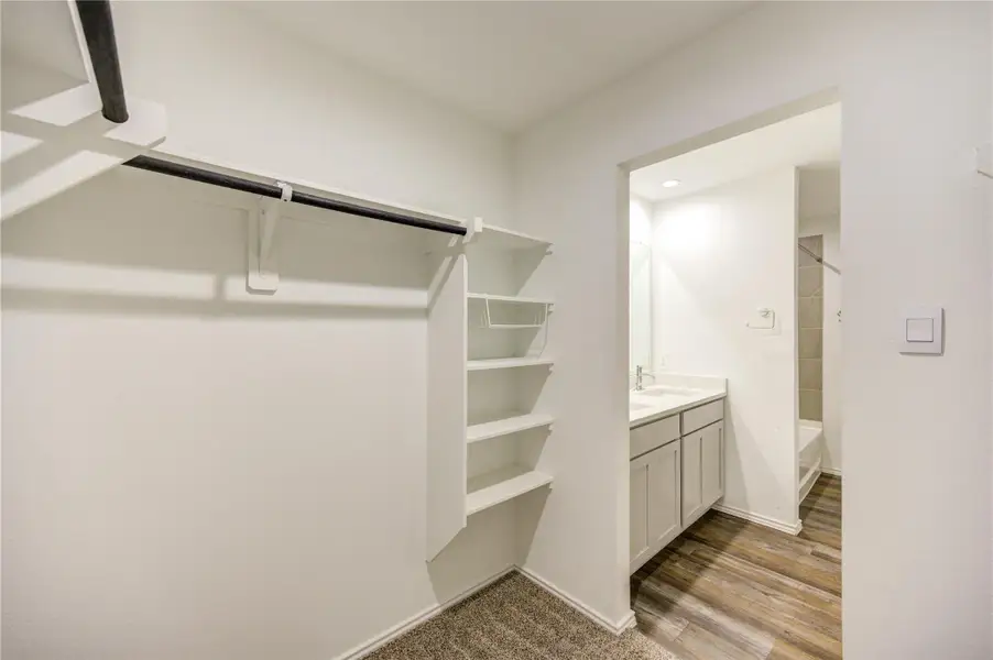 Furnished interior view inside a new home in Breckenridge Forest, Spring (Image 11).