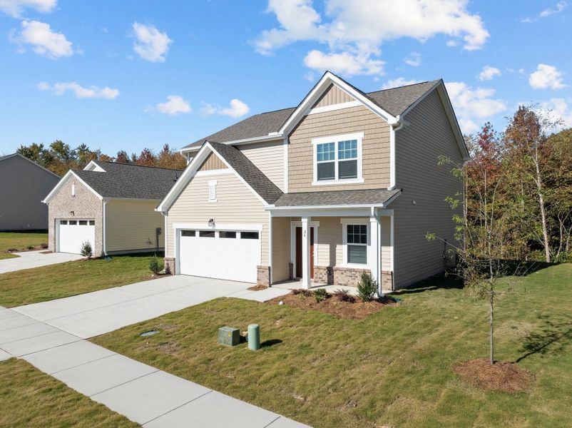Front exterior of a home in the Green Hill community, located in Louisburg, NC (Image 13).