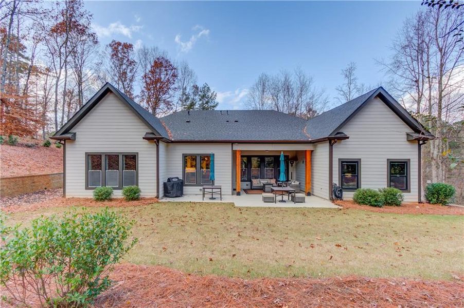 Exterior details and patio area of a home in , Suwanee (Image 25).