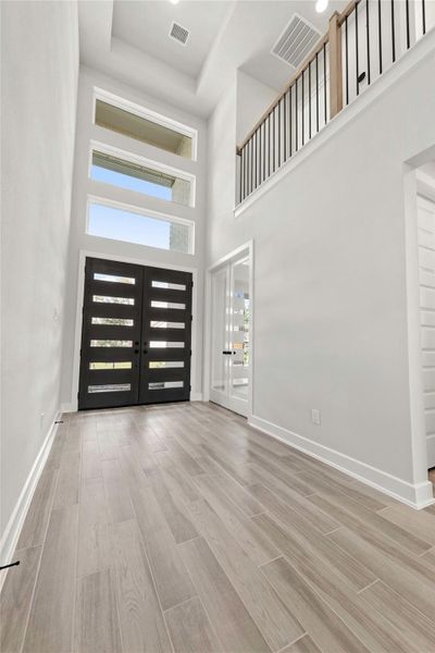 Spacious, unfurnished interior of a new home in The Woodlands Hills – 55', Willis (Image 16). Spacious, unfurnished interior of a new home in The Woodlands Hills – 55', Willis (Image 16).