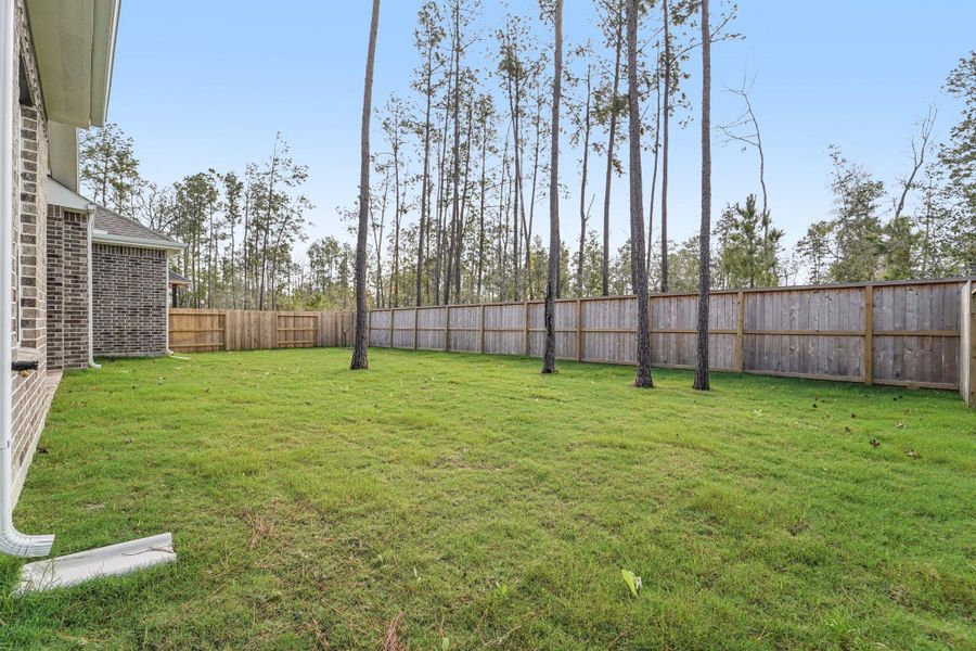 Exterior details and patio area of a home in Evergreen, Conroe (Image 18). Exterior details and patio area of a home in Evergreen, Conroe (Image 18).