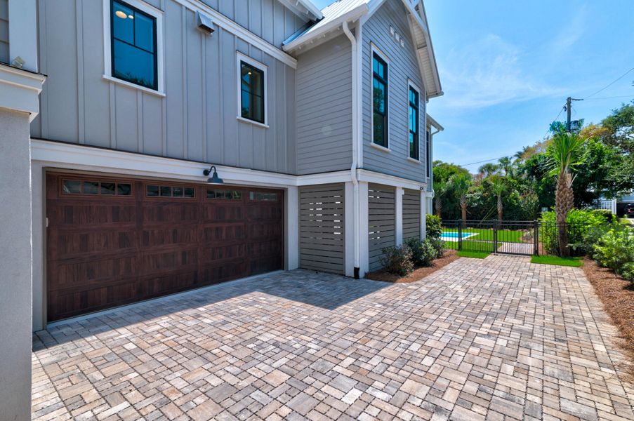 Exterior details and patio area of a home in , Sullivan's Island (Image 38).