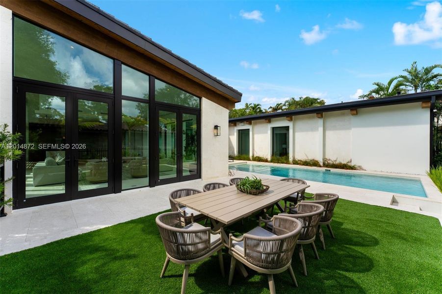 Exterior details and patio area of a home in , Coral Gables (Image 14). Exterior details and patio area of a home in , Coral Gables (Image 14).