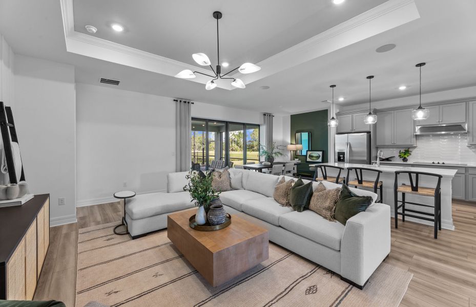 Furnished interior view inside a new home in The Strand at Cedar Grove, North Port (Image 16). Furnished interior view inside a new home in The Strand at Cedar Grove, North Port (Image 16).