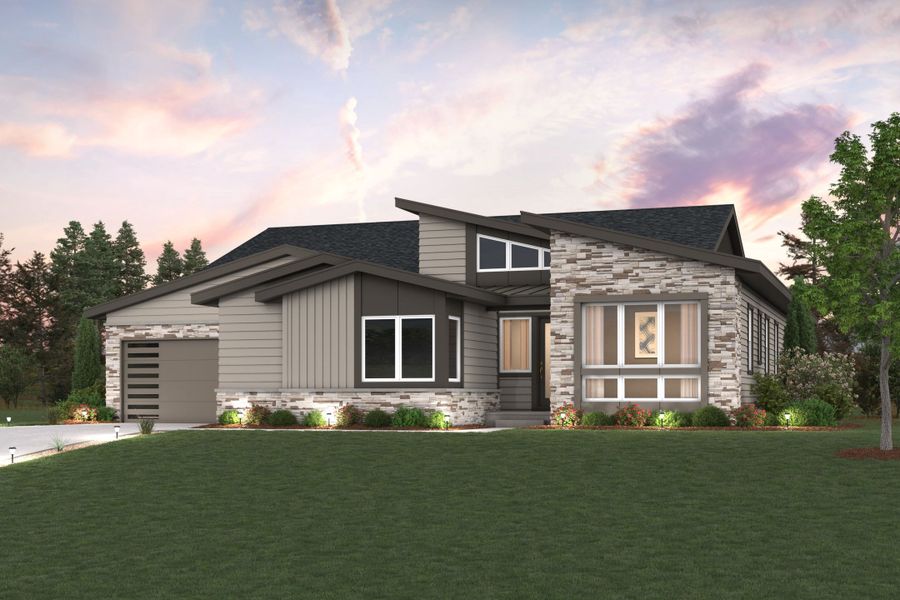 A house with a lawn in front of it.