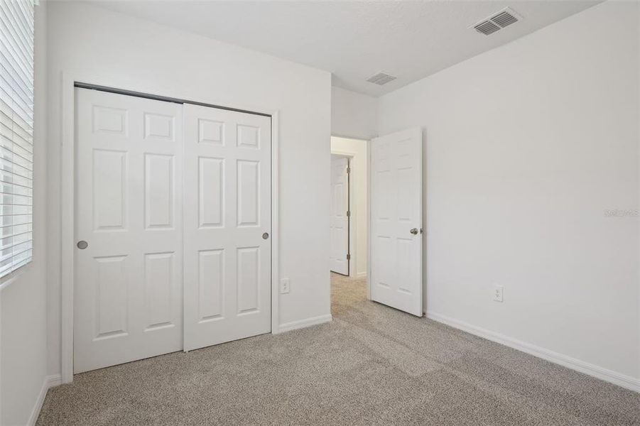 Spacious, unfurnished interior of a new home in Lake Deer Estates - Signature Series, Poinciana (Image 16). Spacious, unfurnished interior of a new home in Lake Deer Estates - Signature Series, Poinciana (Image 16).