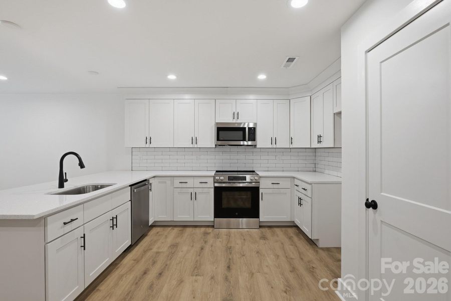 Furnished interior view inside a new home in , Statesville (Image 6).