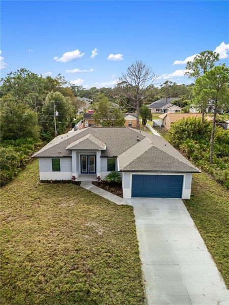 Front exterior of a new home in , North Port, FL, highlighting curb appeal (Image 30).