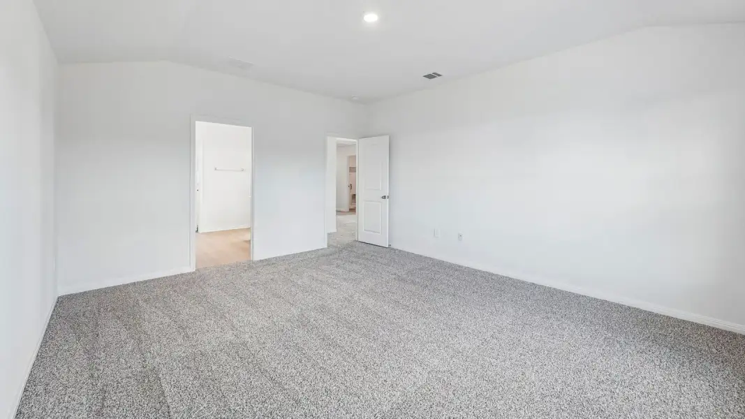 Spacious, unfurnished interior of a new home in Bar W Ranch, Leander (Image 33).