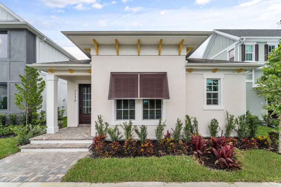 Representative exterior photo of a completed home built from the Monarch by Mattamy Homes in Newfield, Palm City, FL (Image 14).