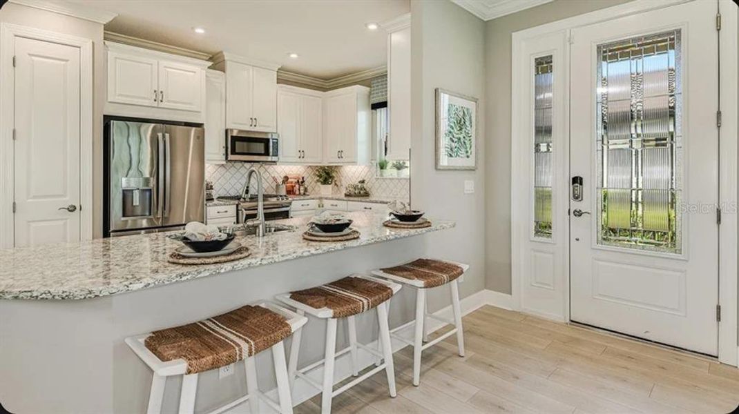 Furnished interior view inside a new home in Esplanade at Azario Lakewood Ranch, Bradenton (Image 4).