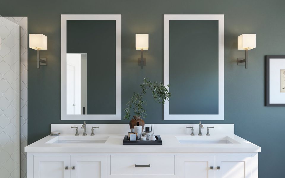 Primary bath with white-framed mirrors