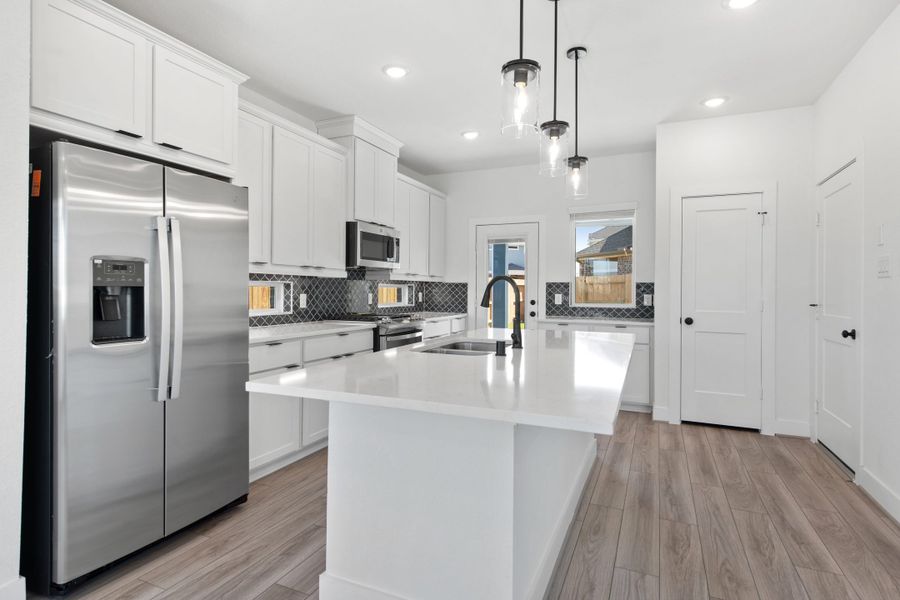 Furnished interior view inside a new home in Sienna, Missouri City (Image 9).
