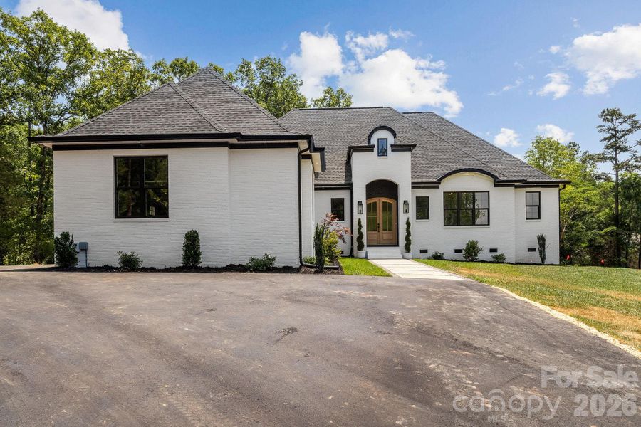 Front exterior of a new home in , Clover, SC, highlighting curb appeal (Image 23).