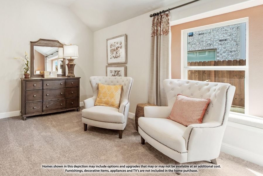Bedroom sitting area with two white tufted armchairs, dark wood dresser with mirror, and carpet flooring Bedroom sitting area with two white tufted armchairs, dark wood dresser with mirror, and carpet flooring