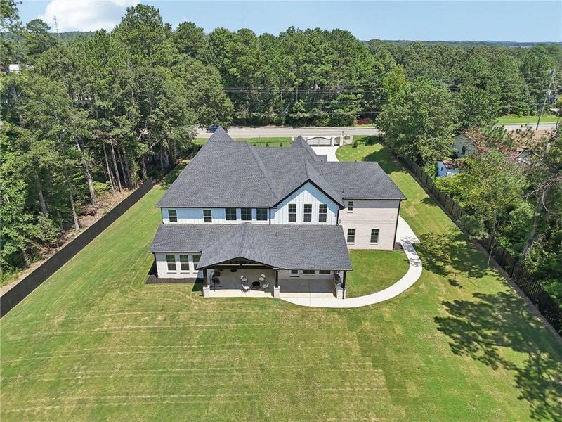 Front exterior of a new home in , Hoschton, GA, highlighting curb appeal (Image 24). Front exterior of a new home in , Hoschton, GA, highlighting curb appeal (Image 24).