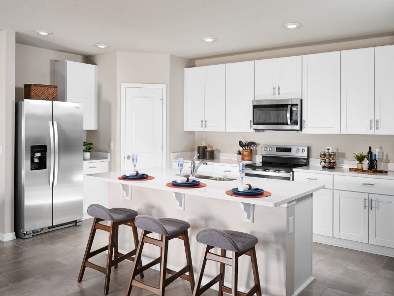 Kitchen of the Foxglove plan modeled at The Reserve at Van Oaks.