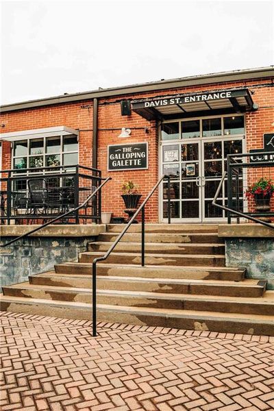 Front exterior of a new home in Rosewood Lake Estates, Hoschton, GA, highlighting curb appeal (Image 44).