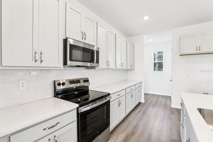 Furnished interior view inside a new home in Ellington Classical, St. Cloud (Image 9). Furnished interior view inside a new home in Ellington Classical, St. Cloud (Image 9).