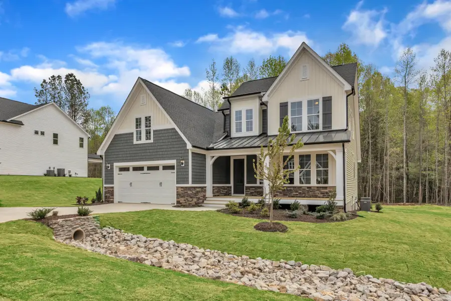 Representative exterior photo of a completed home built from the The Chandler by RobuckHomes in Baylee Ridge, Selma, NC (Image 38). Representative exterior photo of a completed home built from the The Chandler by RobuckHomes in Baylee Ridge, Selma, NC (Image 38).