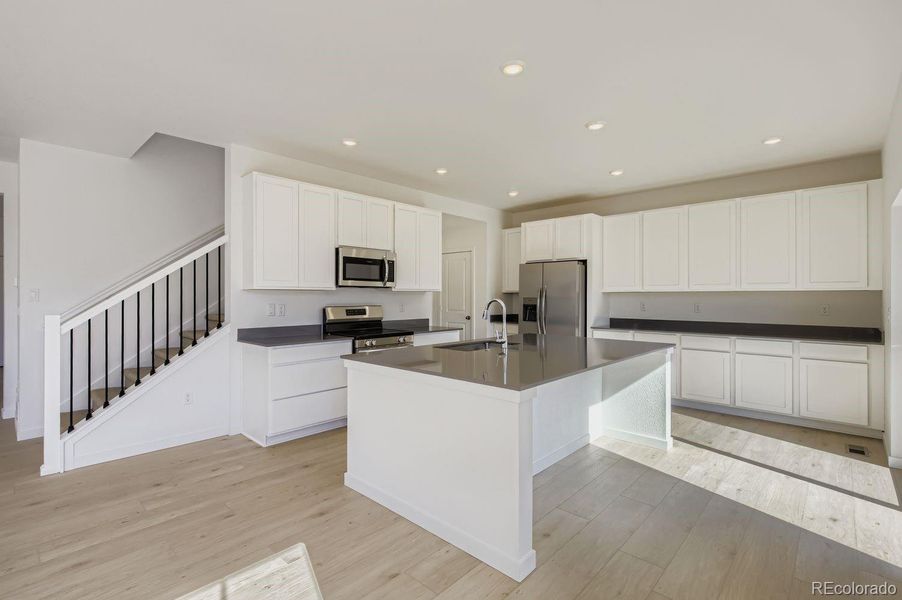 Furnished interior view inside a new home in Riano Ridge: The Pioneer Collection, Loveland (Image 6).