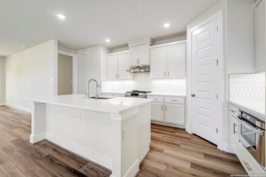 Furnished interior view inside a new home in Crown Ridge Manor, San Antonio (Image 8).