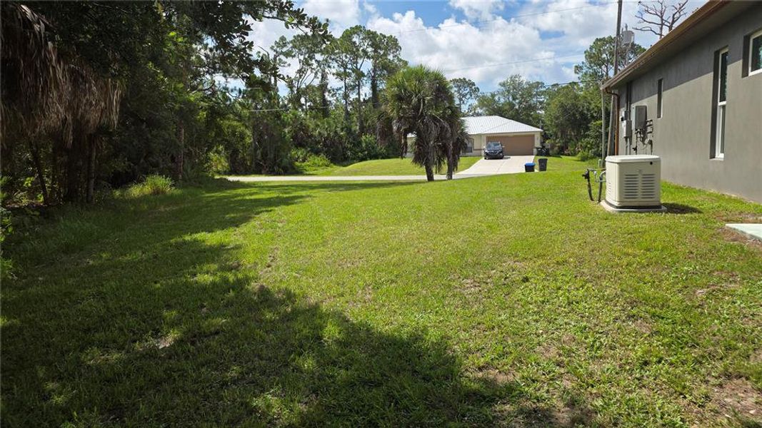 Exterior details and patio area of a home in , North Port (Image 33).