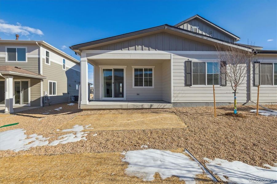 Front exterior of a new home in Skyview at High Point, Aurora, CO, highlighting curb appeal (Image 23).