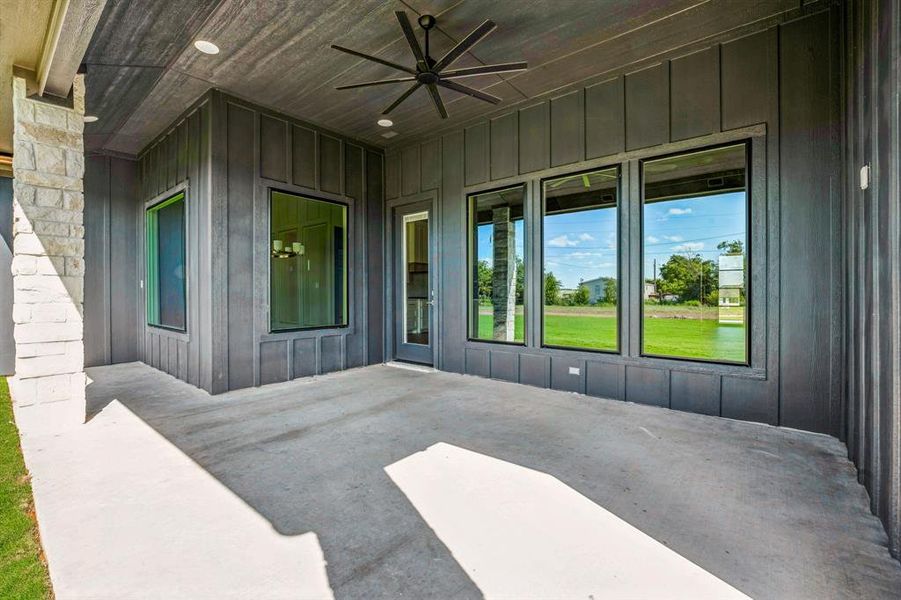 View of patio with ceiling fan