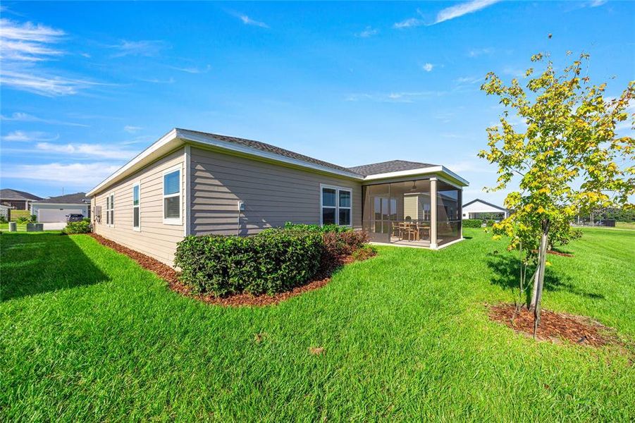 Exterior details and patio area of a home in Pioneer Ranch: Pioneer Ranch 50's, Ocala (Image 21). Exterior details and patio area of a home in Pioneer Ranch: Pioneer Ranch 50's, Ocala (Image 21).