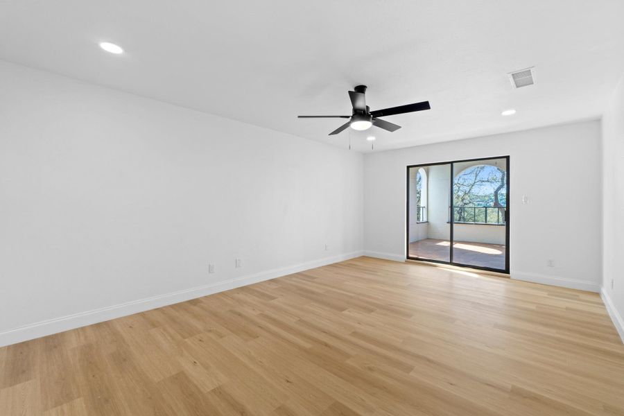 Spacious, unfurnished interior of a new home in , Point Venture (Image 21).