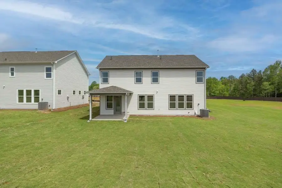 Exterior details and patio area of a home in Maddox Landing, Hoschton (Image 3).