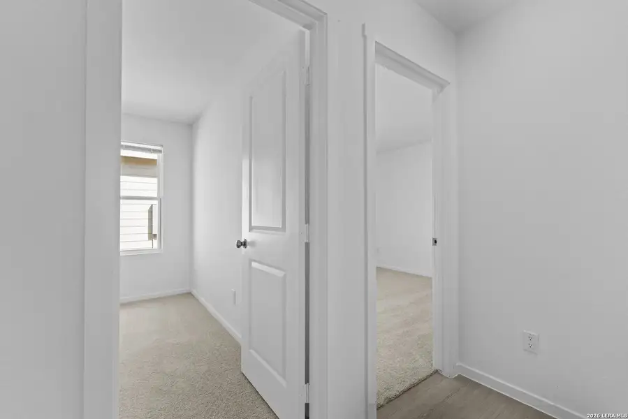 Spacious, unfurnished interior of a new home in Hidden Oasis, San Antonio (Image 12).