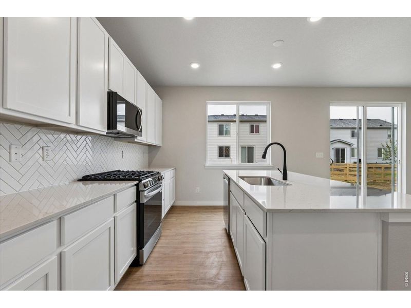 Furnished interior view inside a new home in Prairie Song, Windsor (Image 9).