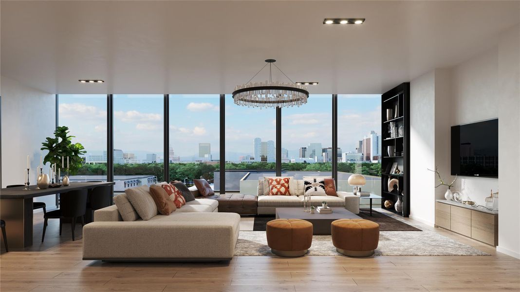 Living room featuring a notable chandelier, expansive windows, and wood finished floors